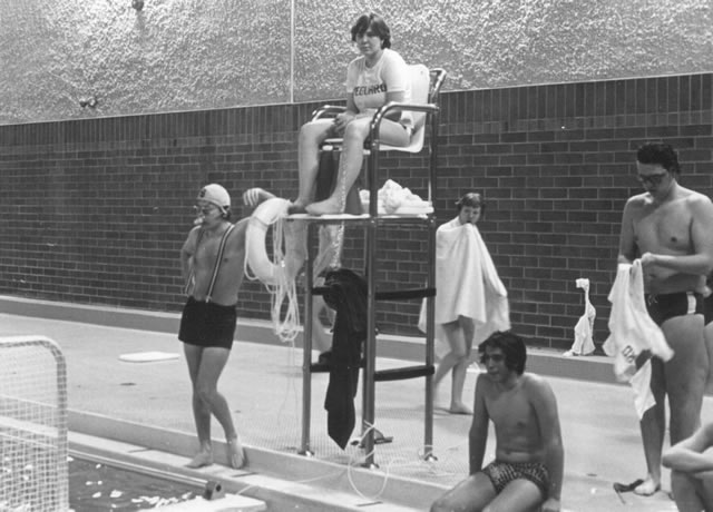 Mr. Clare in bathing cap.